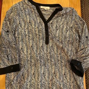 Woman’s size small olive and oak shirt